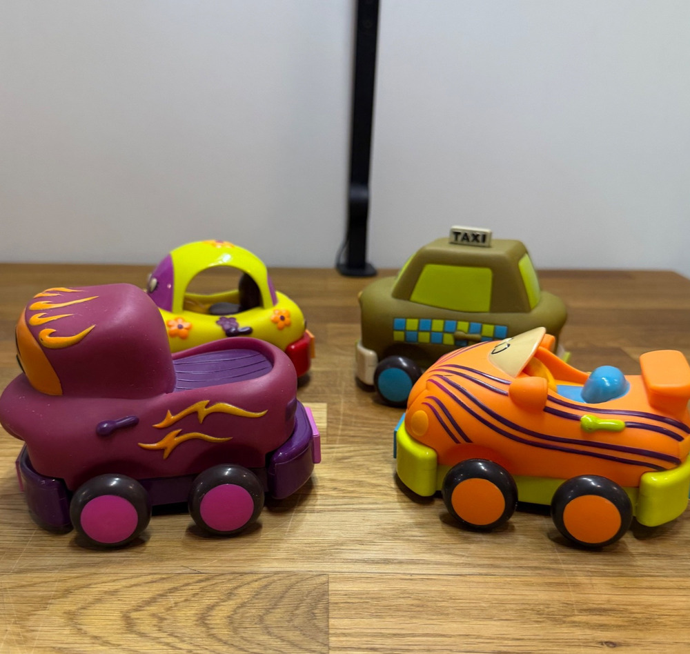 B. Toys Pull Back Trucks Taxi Cab Convertible Lot of 4 Flower Car Play Imaginati